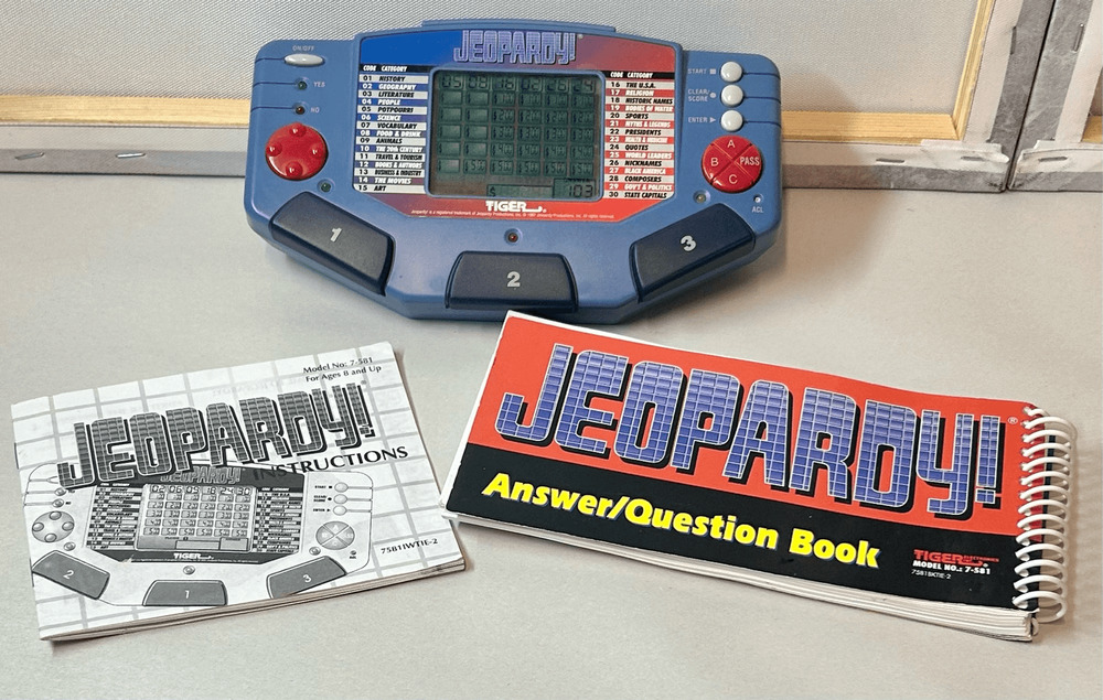 VTG Handheld Jeopardy Electronic Game with Book & Manual Tiger Electronics